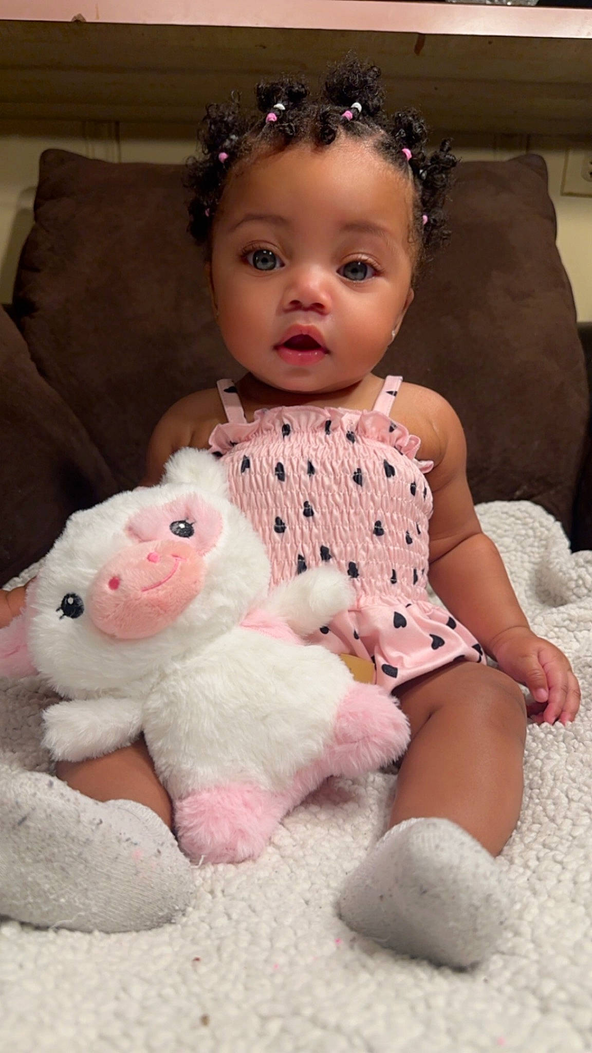 Azia is registered to the contest to win money with this photo: baby, baby_toddler_clothing, beauty, cheek, child, dress, eye, face, foot, happy, head, iris, jewellery, pattern, person, pink, sitting, skin, sleeve, surprise