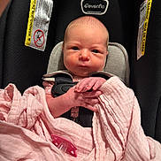 Brooklyn joined the competition — help win amazing prizes! newborn, baby, car_seat, blanket, pink, pacifier, infant, straps, clothing, face, hand, closeup, indoor, child, person, safety, seat, infant_care, wrapped, cute