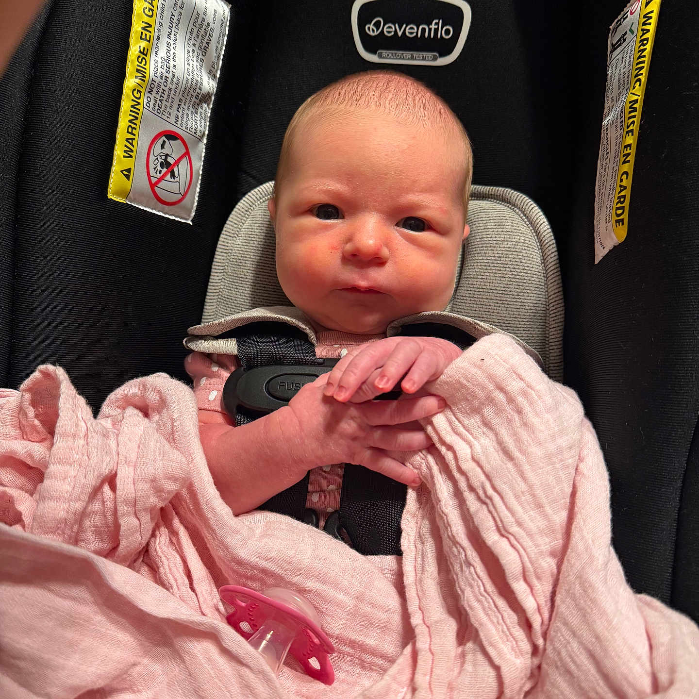 Brooklyn joined the competition — help win amazing prizes! newborn, baby, car_seat, blanket, pink, pacifier, infant, straps, clothing, face, hand, closeup, indoor, child, person, safety, seat, infant_care, wrapped, cute