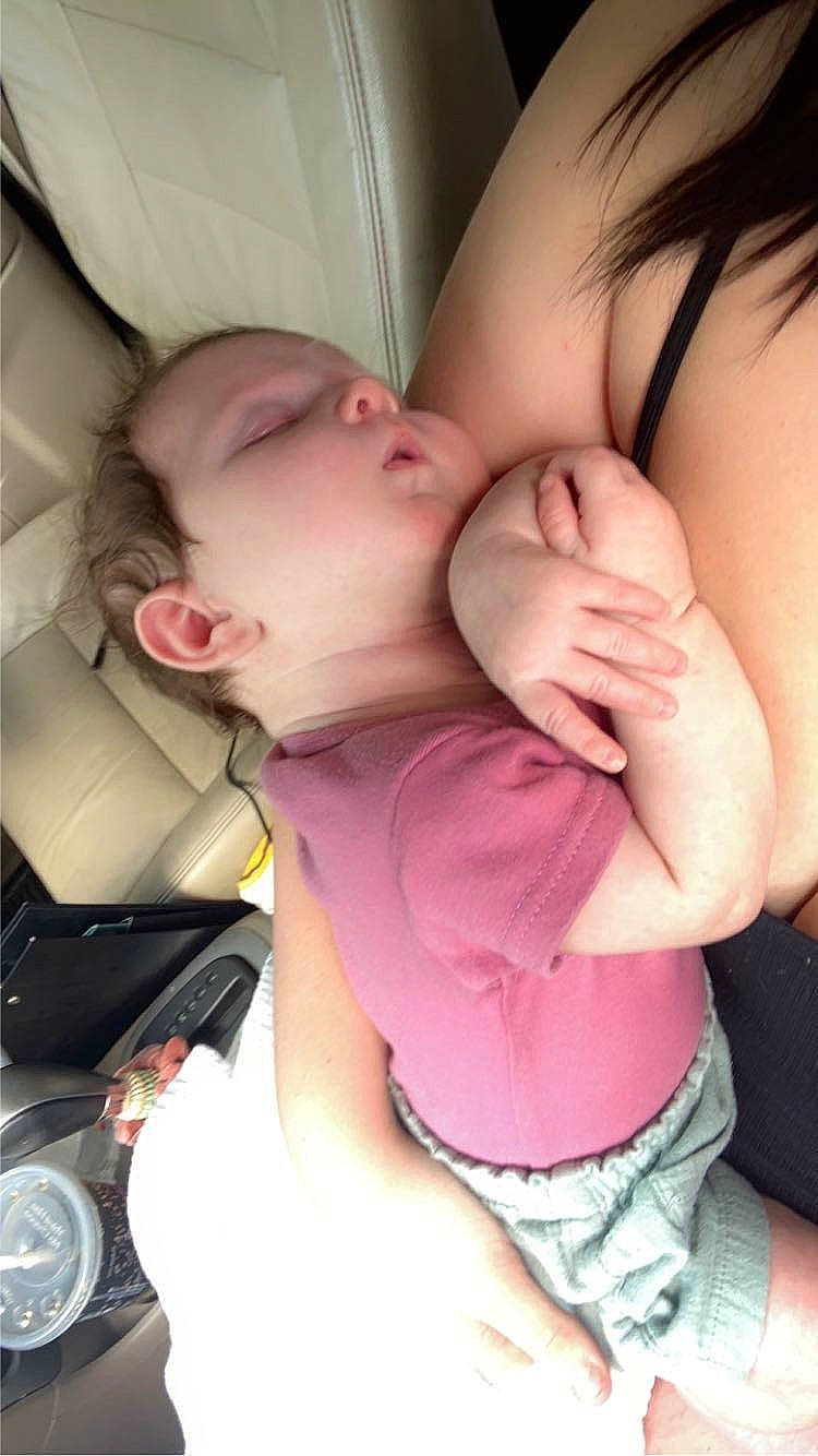 Hadley is registered to the contest to win money with this photo: abdomen, baby, baby_toddler_clothing, cheek, chest, child, comfort, elbow, eyelash, finger, gesture, happy, human_body, mouth, nail, person, pink, product, skin, toddler