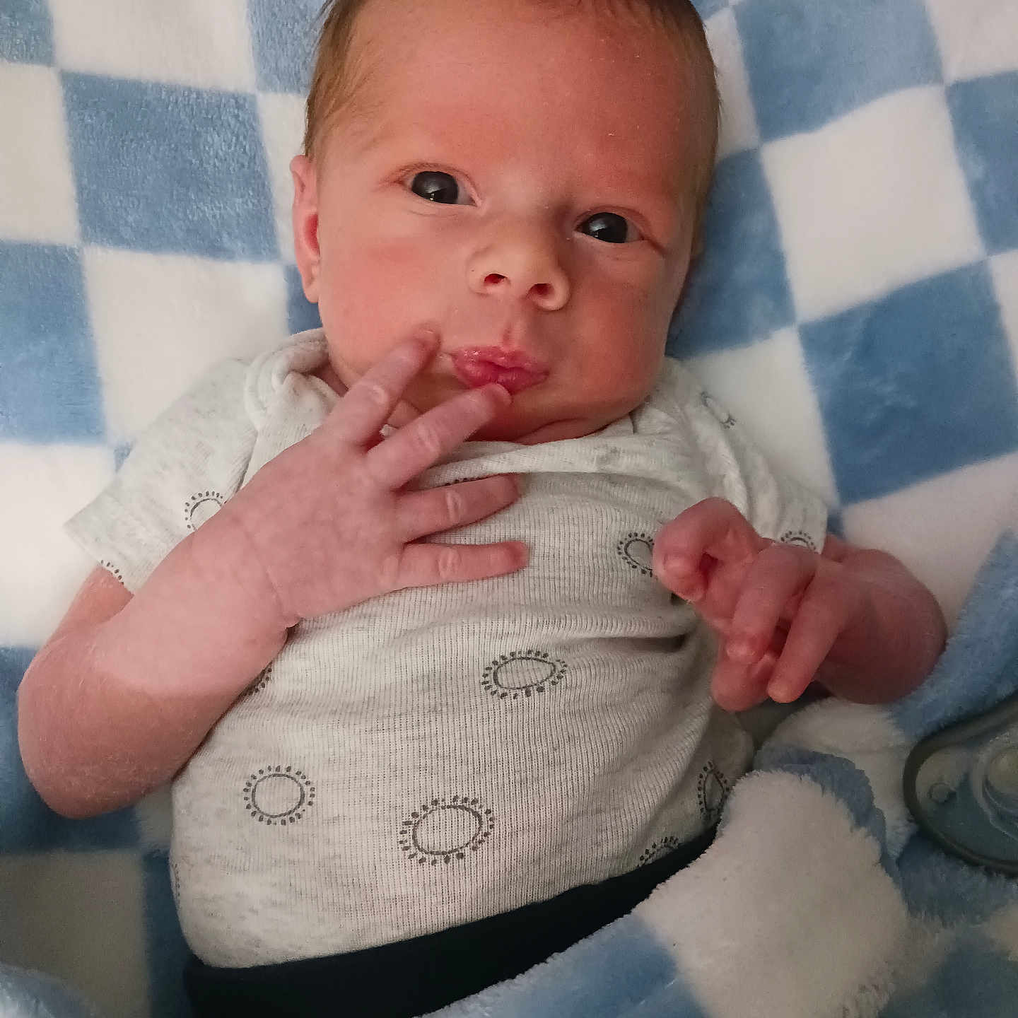 Zandrew joined the competition — help win amazing prizes! baby, bedding, blanket, blue, checkered_pattern, close_up, cute, eyes, face, fingers, hand, infant, lying_down, mouth, newborn, onesie, pacifier, portrait, skin, soft_texture