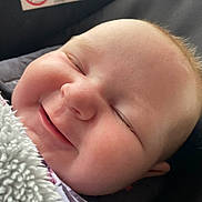 Luciana joined the competition — help win amazing prizes! baby, infant, smiling, face, closeup, blanket, sleeping, cozy, child, soft, cute, skin, head, peaceful, happy, newborn, expression, comfort, warm, relaxation