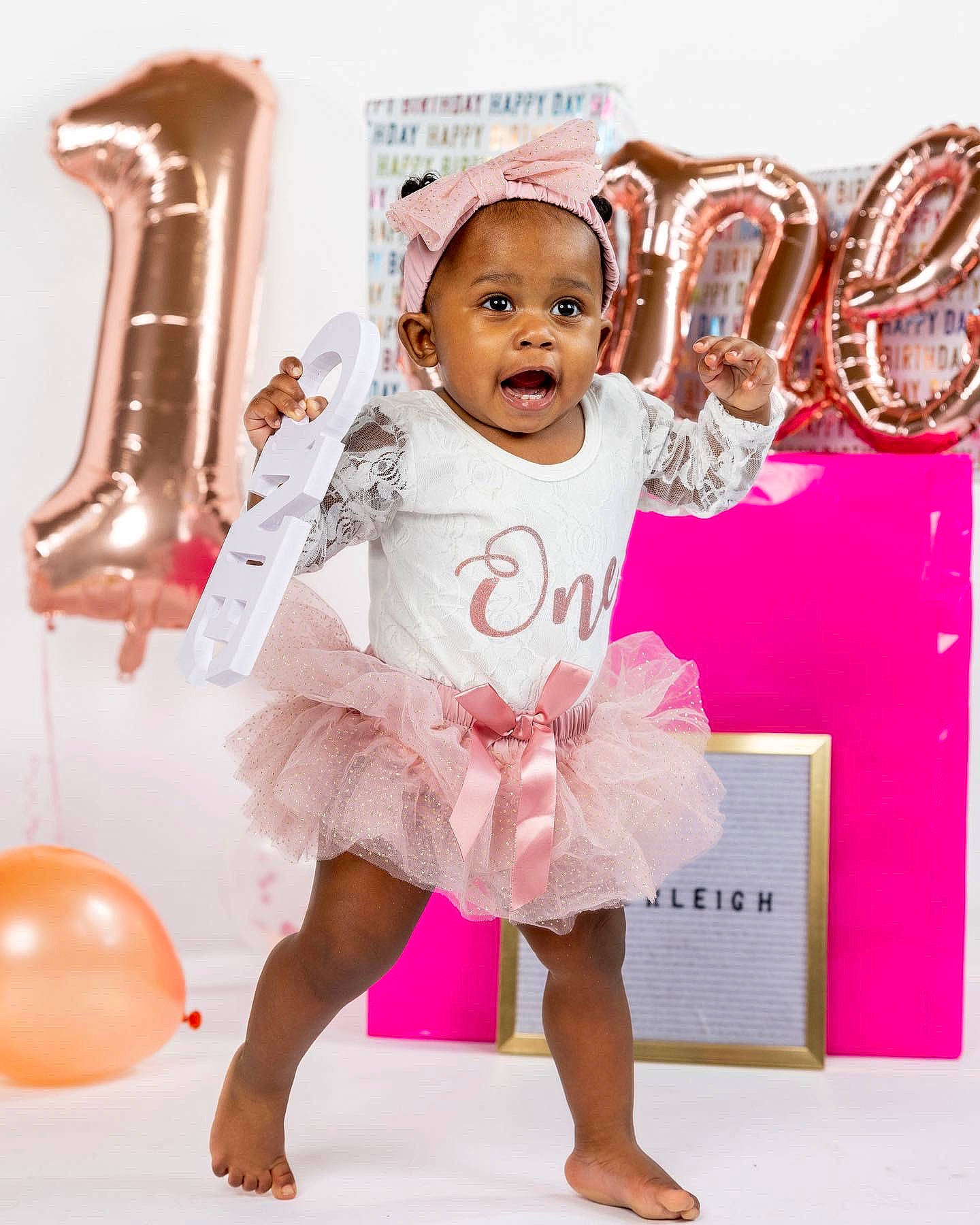 Everleigh joined the competition — help win amazing prizes! baby, baby_toddler_clothing, balloon, barefoot, child, event, fashion, fun, gesture, happy, magenta, one_piece_garment, party_supply, peach, people, person, pink, product, sleeve, smile