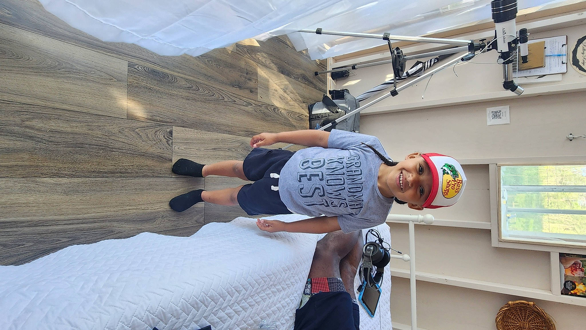 Harrison joined the competition — help win amazing prizes! ceiling, concrete, fun, hat, headwear, joy, landscape, leisure, person, recreation, room, shade, smile, t_shirt, travel, vacation