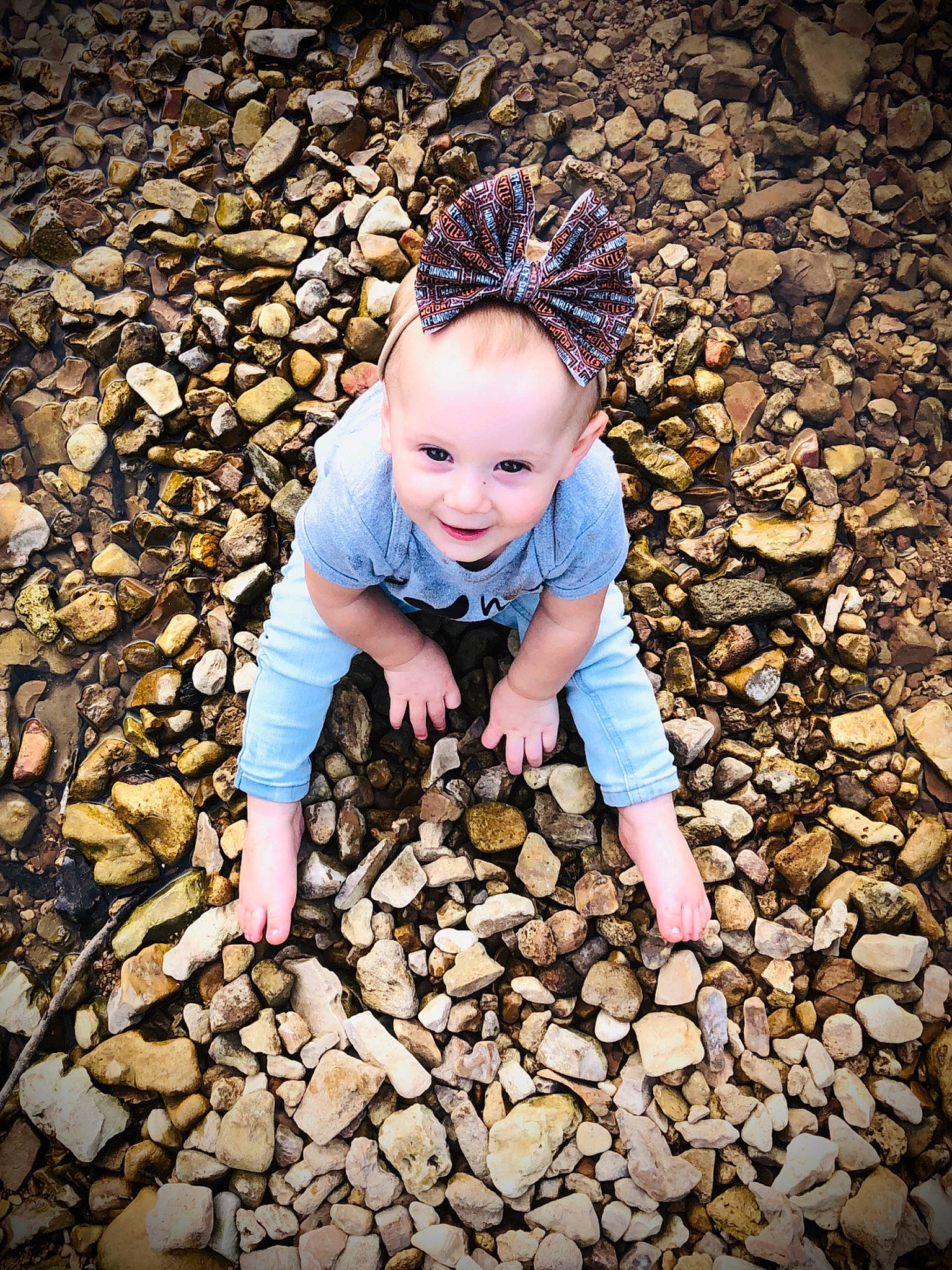 Delilah is registered to the contest to win money with this photo: autumn, child, child_model, fun, gravel, happy, joy, leaf, pebble, people_in_nature, person, photograph, photography, play, rock, soil, toddler, tree
