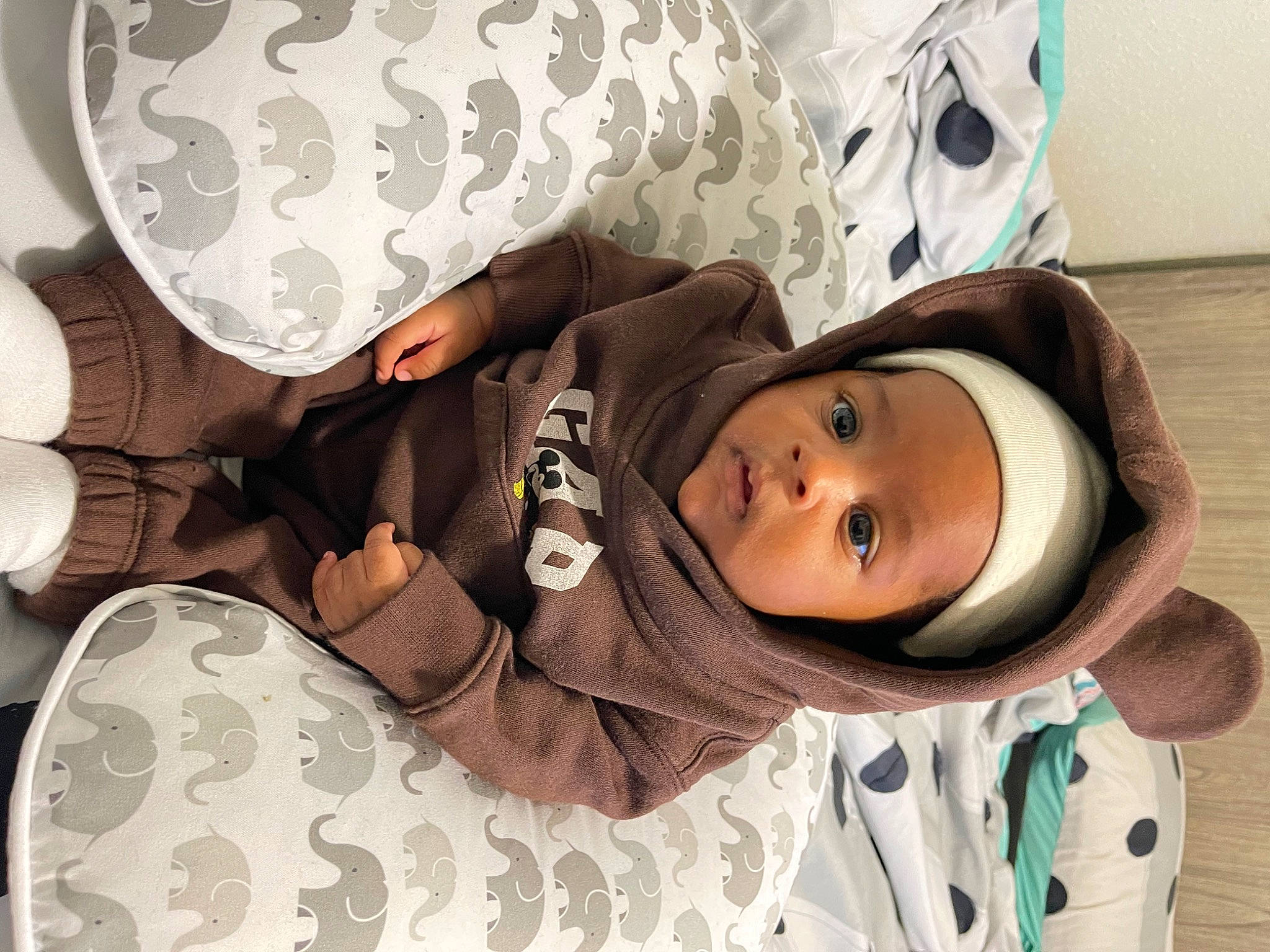 Ashton joined the competition — help win amazing prizes! baby, baby_products, baby_sleeping, baby_toddler_clothing, bedding, bedtime, child, comfort, eyelash, fashion_accessory, happy, hat, headgear, headwear, human_leg, linens, pattern, person, room, sleeve