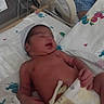Luna joined the competition — help win amazing prizes! newborn, baby, hospital, bed, diaper, hat, person, blanket, medical, infant, resting, patient, healthcare, cute, sleeping, maternity, child, young, hospital_room, parent