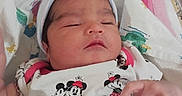 Luna is registered to the contest to win money with this photo: baby, bed, blanket, cartoon, child, clothing, cute, hand, hat, indoors, infant, mickey_mouse, minnie_mouse, newborn, nursery, peaceful, portrait, resting, sleeping, soft_toys