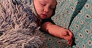 Zaidyn is registered to the contest to win money with this photo: arm, baby, bed, blanket, blue, child, cozy, cute, grey, head, indoor, patterned, peaceful, person, pillow, relaxed, rest, sleeping, soft, toddler