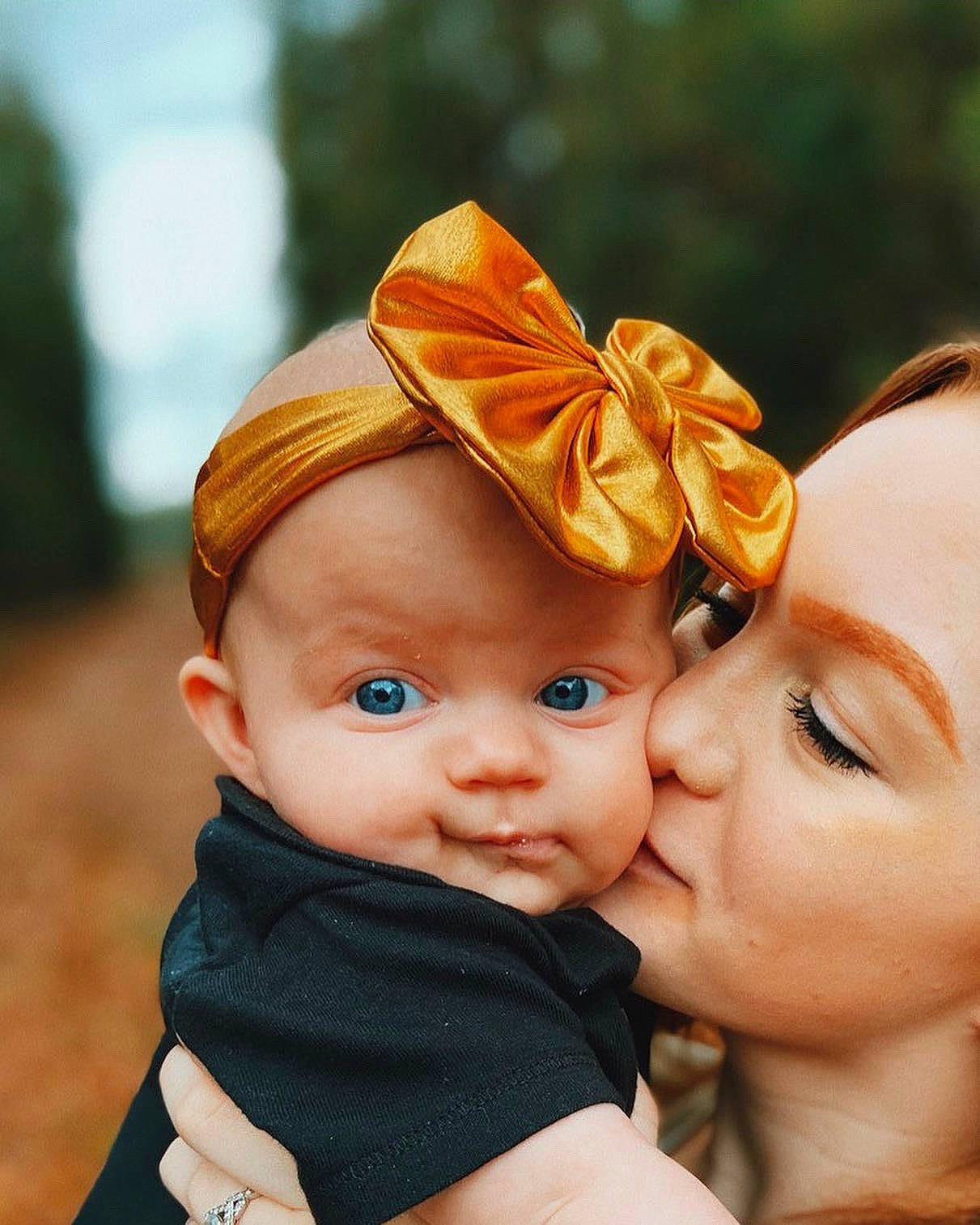 Anniston joined the competition — help win amazing prizes! baby, cheek, child, ear, fashion_accessory, hair_accessory, happy, head, headband, headgear, person, photography, product, skin, smile, toddler, yellow