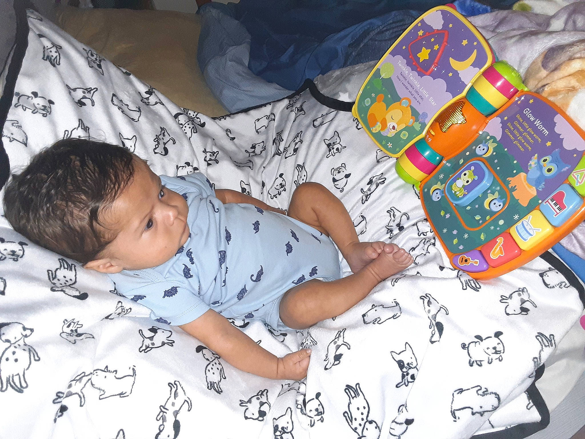 Zyler joined the competition — help win amazing prizes! art, baby, baby_toddler_clothing, bed_sheet, bedding, bedtime, book, child, comfort, fun, linens, pattern, people, person, product, room, sitting, sleeve, t_shirt, textile