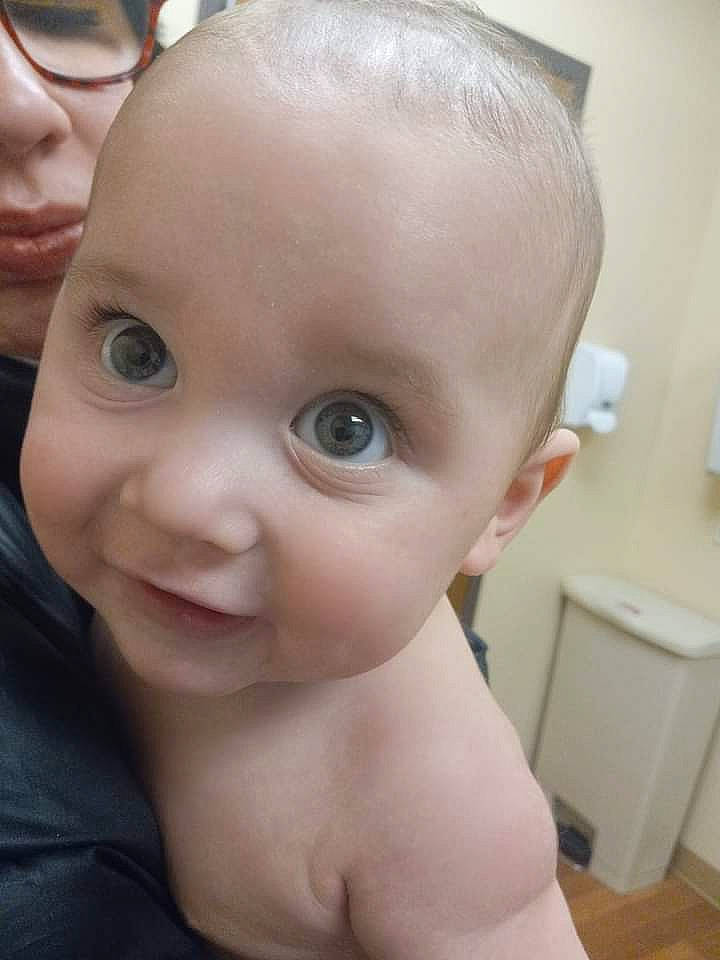 Enrique is registered to the contest to win money with this photo: baby, cabinetry, cheek, chest, child, drawer, ear, eyelash, forehead, gesture, happy, iris, jaw, lip, mouth, no_expression, nose, person, skin, smile