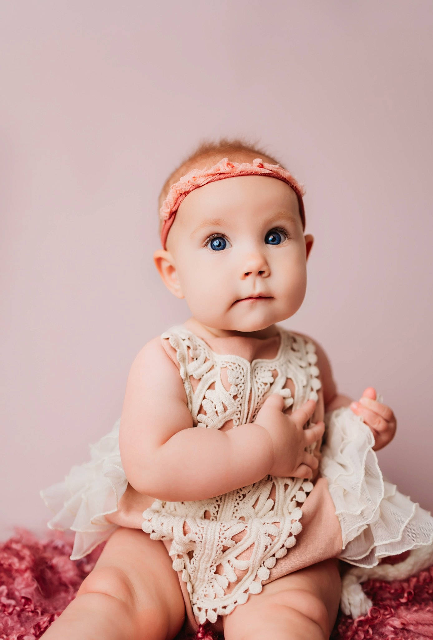 Hattie is registered to the contest to win money with this photo: baby, baby_toddler_clothing, cheek, day_dress, dress, embellishment, eyelash, fashion_accessory, flash_photography, hair_accessory, headband, iris, jewellery, lip, neck, one_piece_garment, peach, person, pink, sleeve