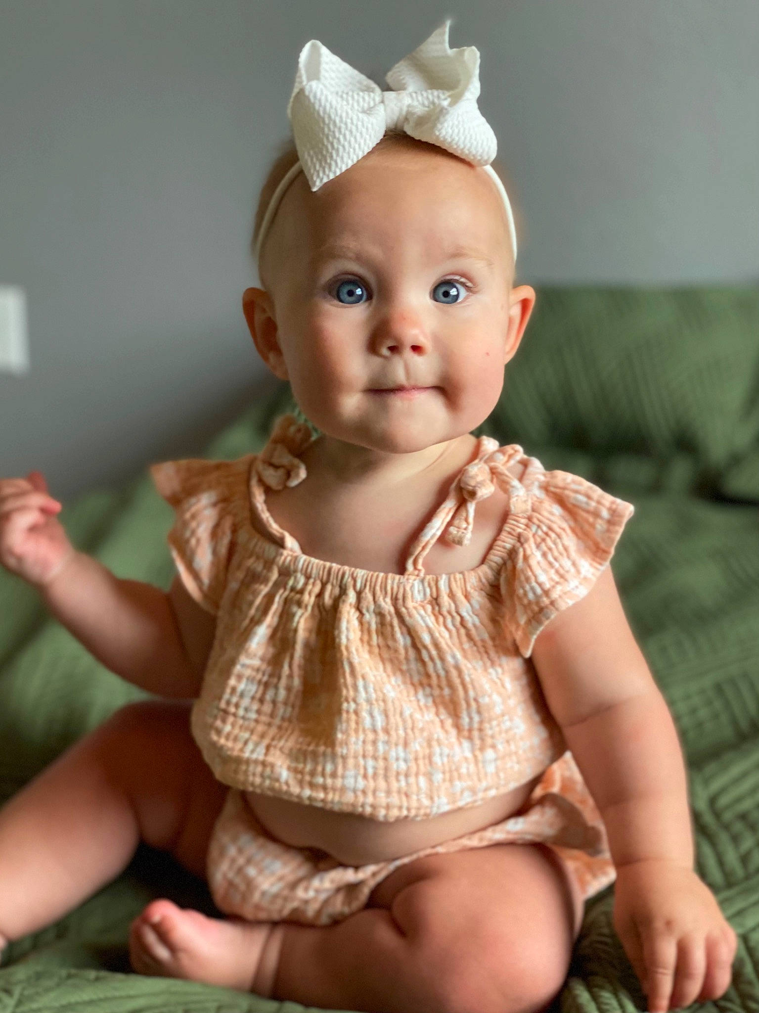 Hattie joined the competition — help win amazing prizes! arm, baby, baby_toddler_clothing, cheek, chin, dress, eye, face, finger, hand, head, human_body, iris, lip, neck, person, pink, skin, sleeve, standing