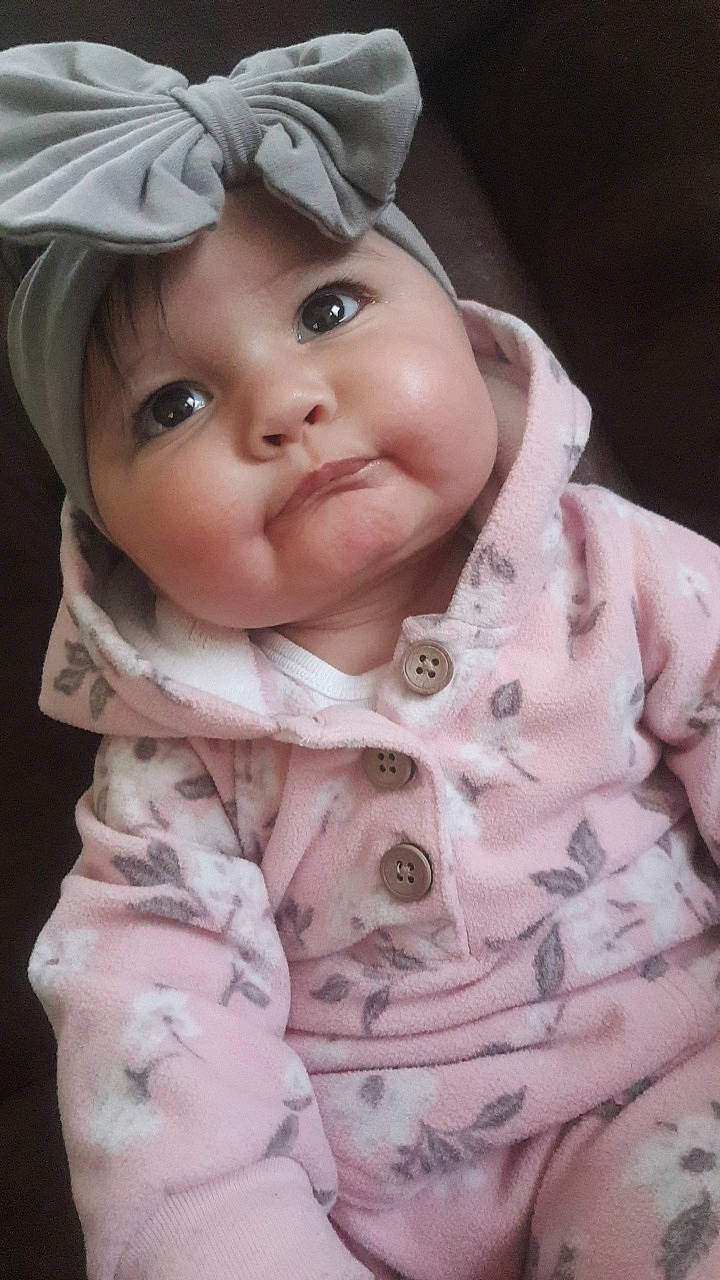 Bonnie joined the competition — help win amazing prizes! baby, cheek, child, eye, face, head, headgear, iris, lip, nose, person, pink, skin, smile, toddler