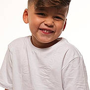 Norberto joined the competition — help win amazing prizes! child, boy, smiling, white_tshirt, portrait, short_hair, happy, cute, studio, young, fashion, casual, innocent, light_skin, person, headshot, face, kid, positive, youth