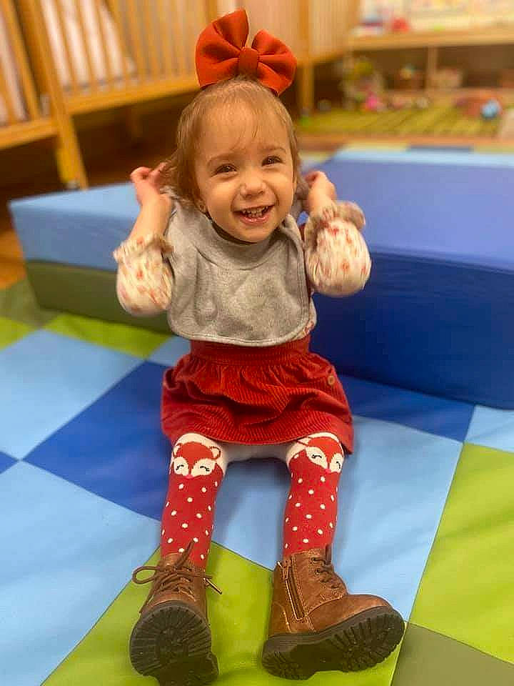 Calliope joined the competition — help win amazing prizes! baby, baby_toddler_clothing, child, electric_blue, face, floor, flooring, fun, hair, happy, head, human_leg, joy, knee, leisure, person, pink, skin, sleeve, smile