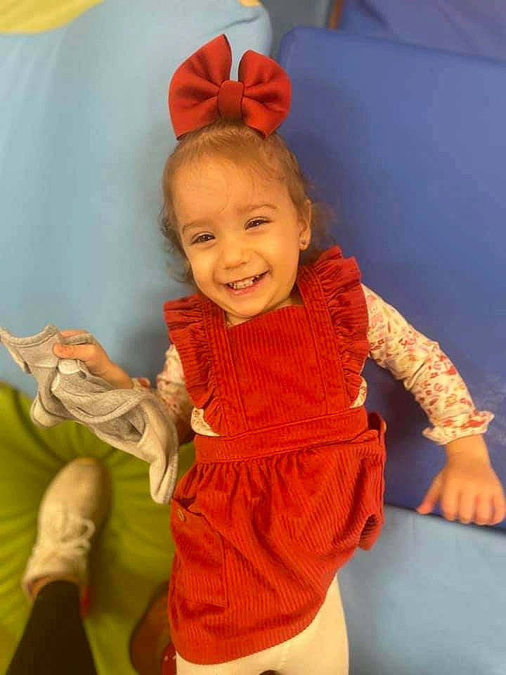 Calliope joined the competition — help win amazing prizes! baby, baby_toddler_clothing, child, costume, event, fun, happy, headpiece, human_body, joy, leisure, magenta, orange, person, pink, room, skin, sleeve, smile, textile