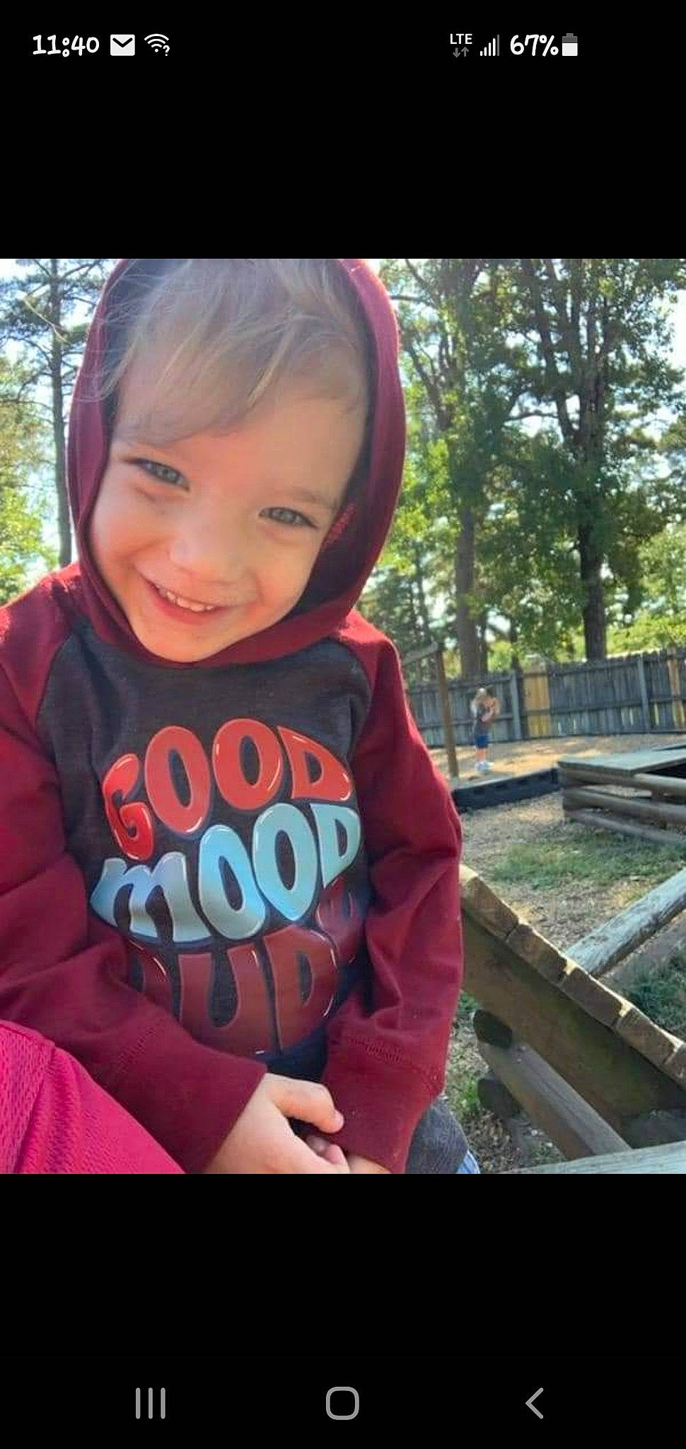 Oliver is registered to the contest to win money with this photo: baby_toddler_clothing, child, cool, electric_blue, fun, grass, happy, joy, leisure, magenta, morning, neck, person, plant, recreation, sleeve, smile, summer, swing, t_shirt