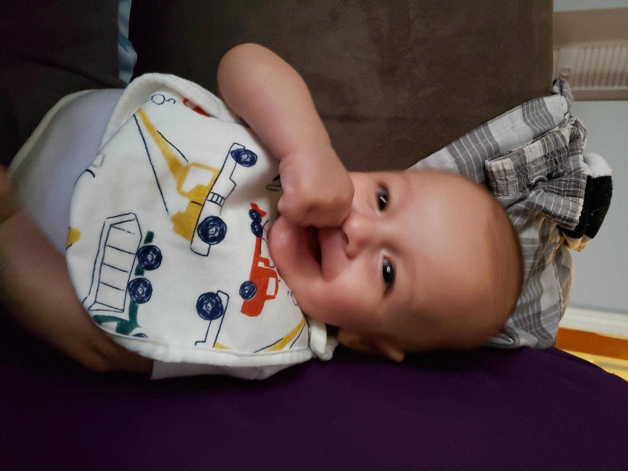 Maverick is registered to the contest to win money with this photo: baby, baby_toddler_clothing, carmine, cheek, child, comfort, eye, finger, fun, happy, head, headgear, lip, mammal, mouth, nose, person, sitting, skin, sleeve