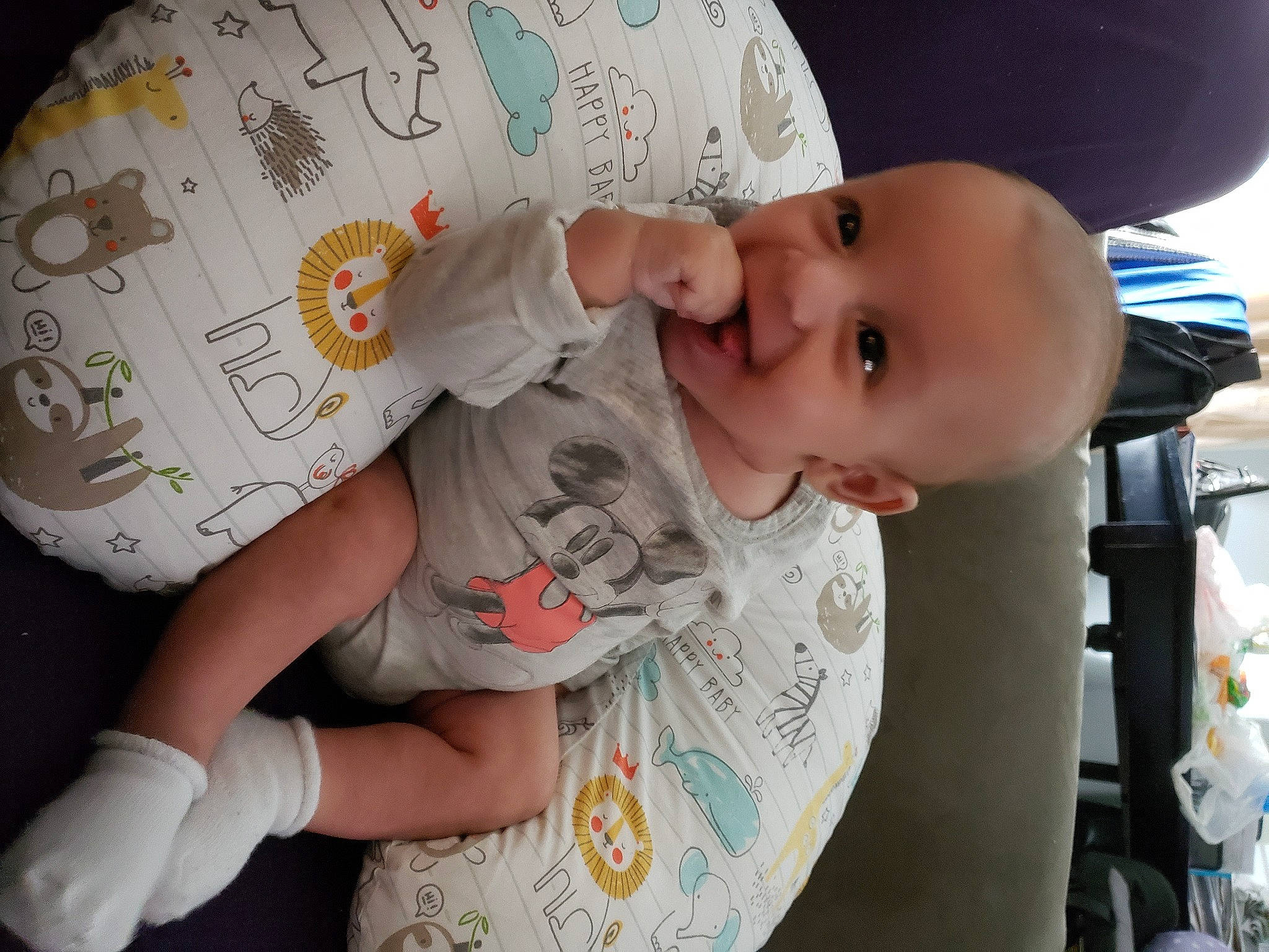 Maverick is registered to the contest to win money with this photo: arm, baby, baby_toddler_clothing, cheek, finger, hairstyle, hand, happy, headgear, human, lip, mouth, nail, neck, nose, person, skin, sleeve, smile, t_shirt