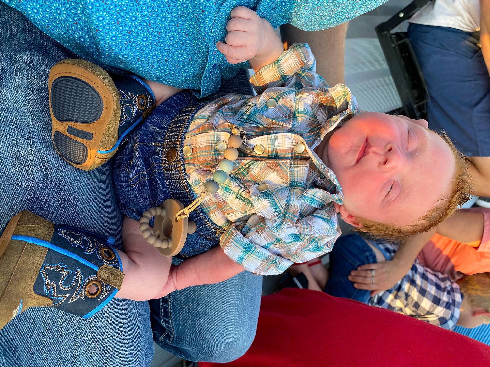 Wylder joined the competition — help win amazing prizes! baby, blue, child, electric_blue, event, fashion_accessory, finger, fun, gesture, hand, happy, mammal, nail, pattern, person, sitting, sleeve, toddler, wrist