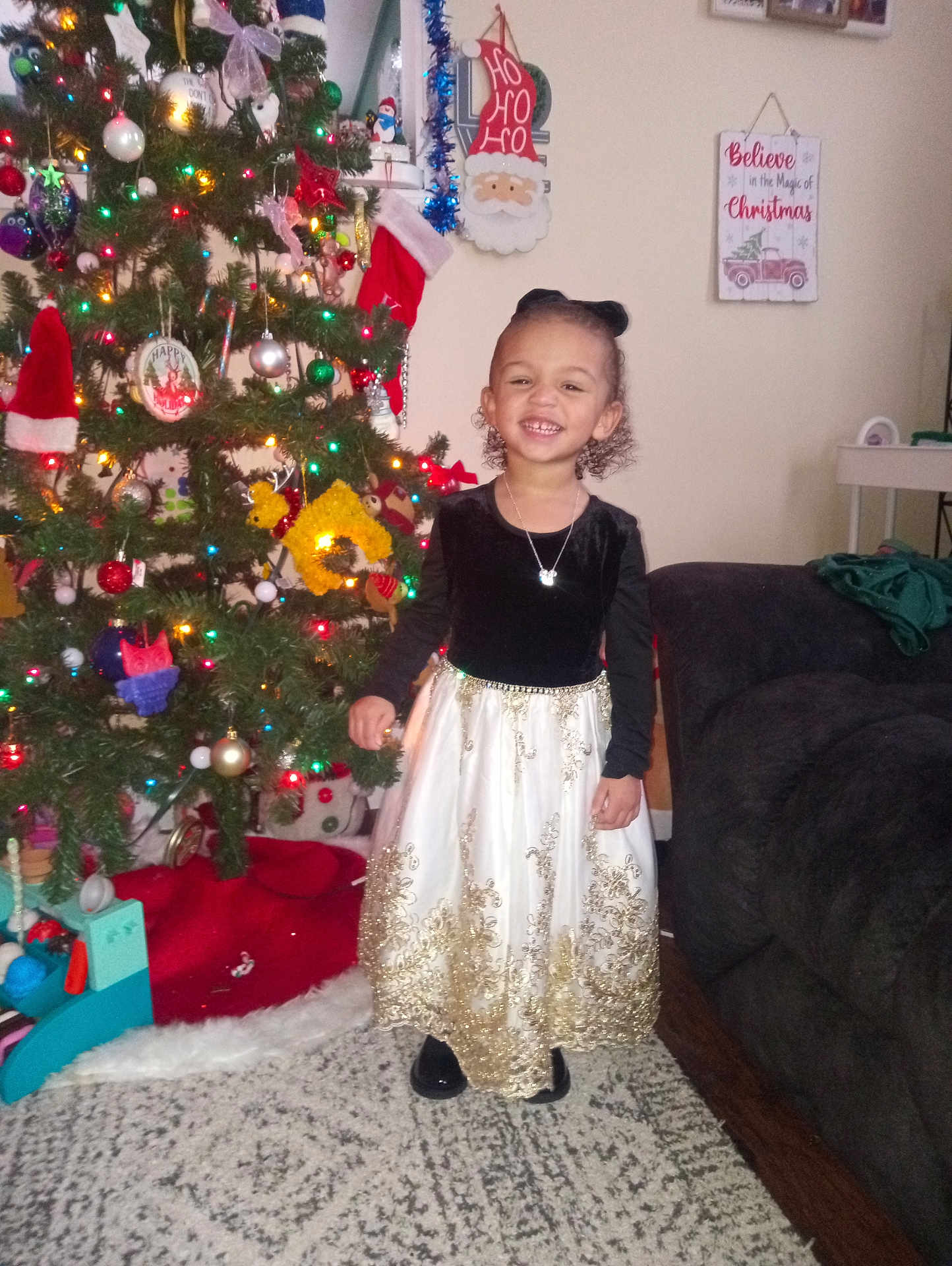 Leila is registered to the contest to win money with this photo: accessories, architecture, building, child, clothing, couch, dress, face, female, furniture, girl, head, indoors, jewelry, livingroom, person, photography, portrait, room, skirt