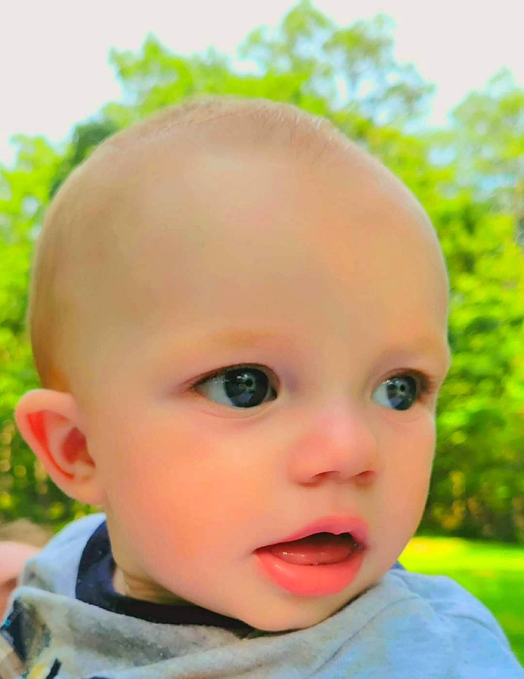 Tanner joined the competition — help win amazing prizes! baby, baby_toddler_clothing, cheek, child, chin, close_up, eyebrow, eyelash, grass, hairstyle, happy, iris, lip, mammal, nose, person, plant, skin, sky, surprise