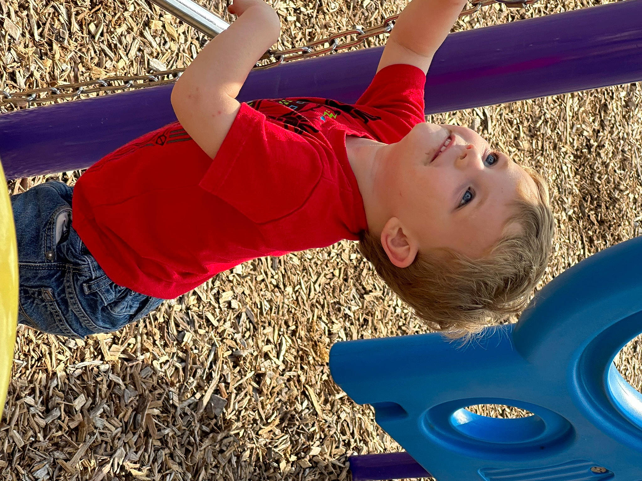 Tanner joined the competition — help win amazing prizes! arm, balance, blue, child, electric_blue, fun, grass, happy, human_leg, knee, leisure, outdoor_play_equipment, people_in_nature, person, recreation, red, sportswear, t_shirt, thigh, toddler