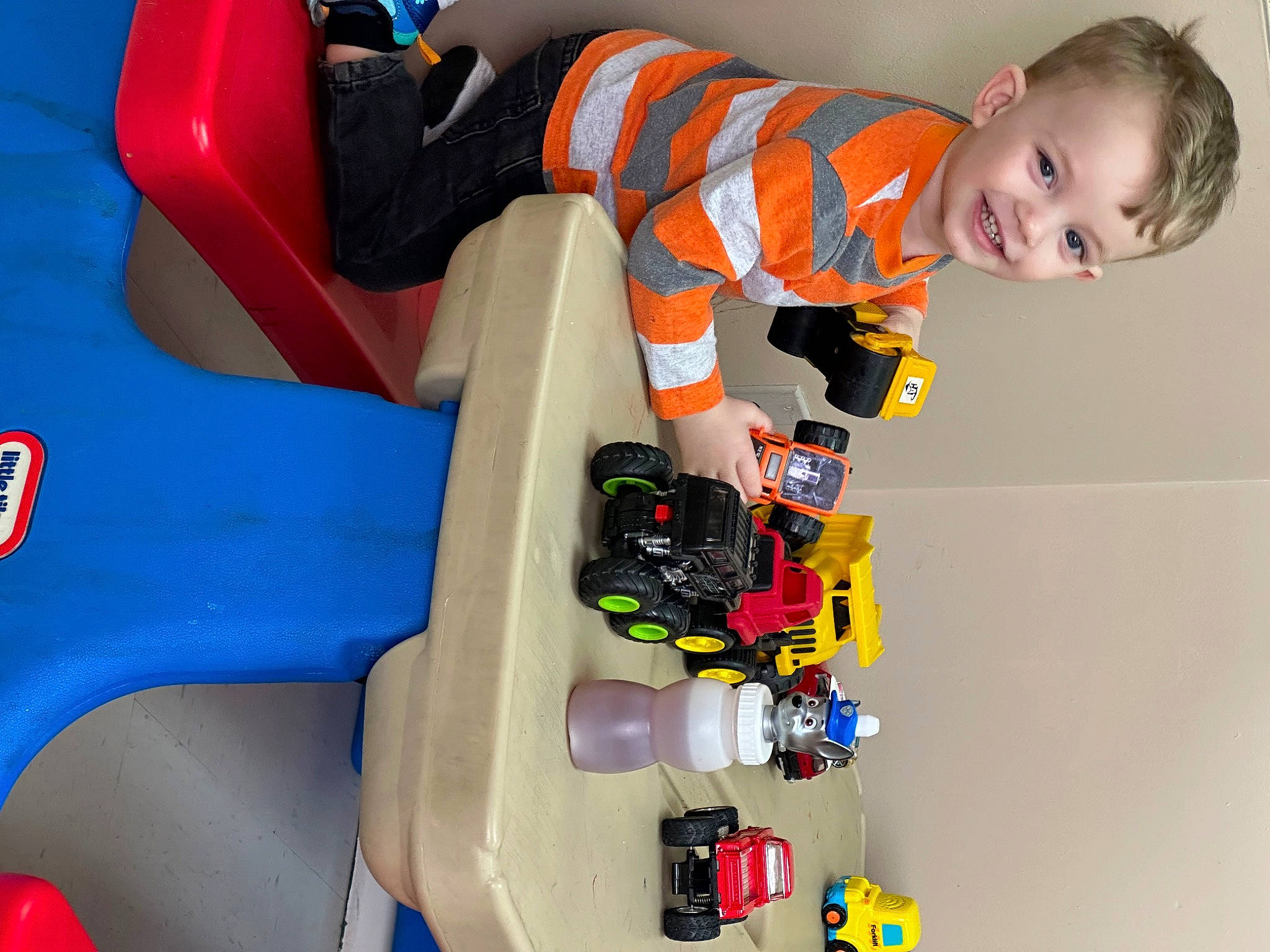 Tanner joined the competition — help win amazing prizes! baby, baby_products, baby_toddler_clothing, baby_toys, carmine, child, electric_blue, fun, joy, machine, person, plastic, play, recreation, sleeve, smile, toddler, toy, toy_vehicle, wheel