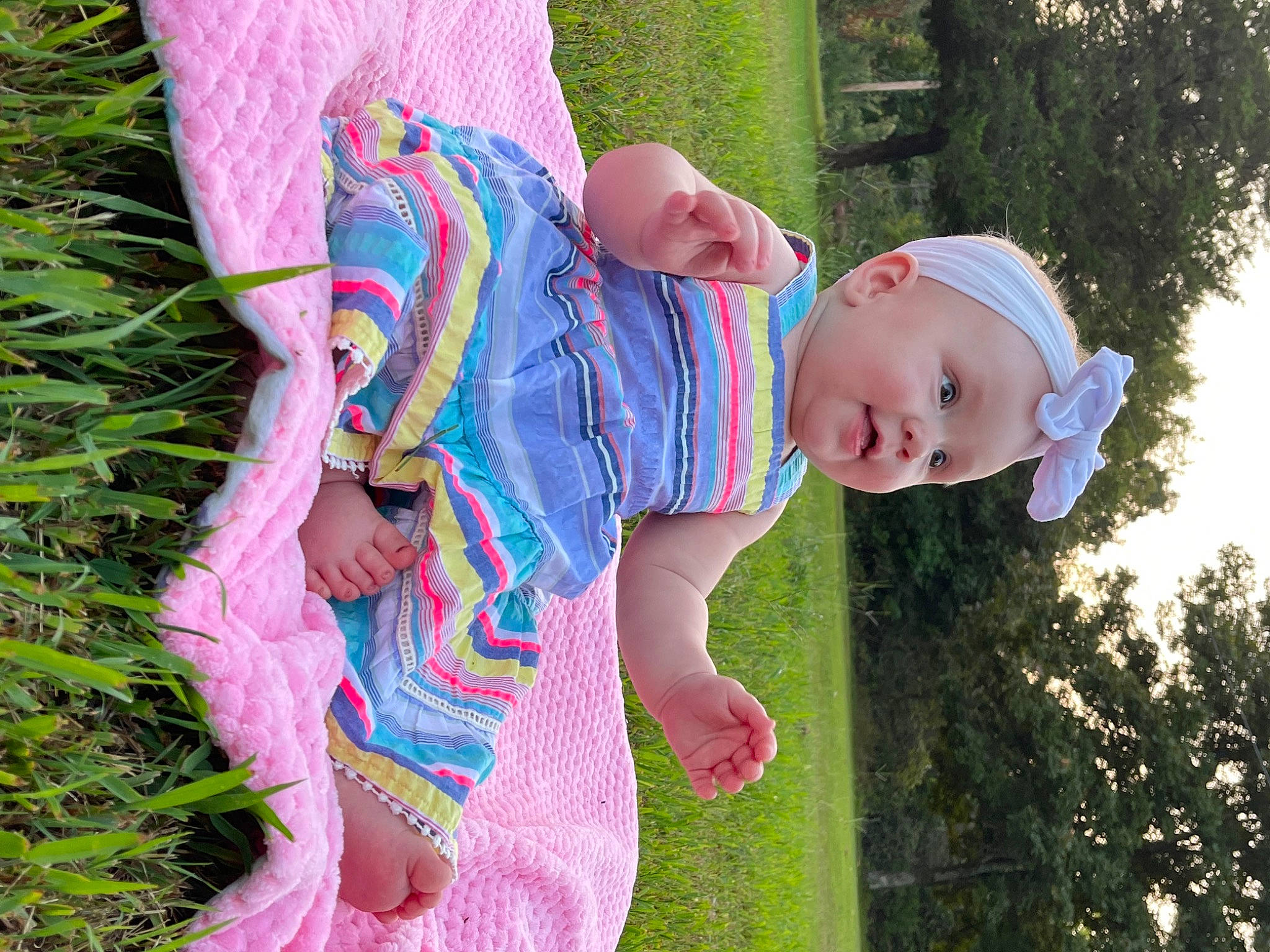Brinleigh joined the competition — help win amazing prizes! baby, baby_toddler_clothing, child, fun, grass, grass_family, green, happy, hat, headwear, lawn, leisure, magenta, meadow, people_in_nature, person, pink, plant, recreation, smile