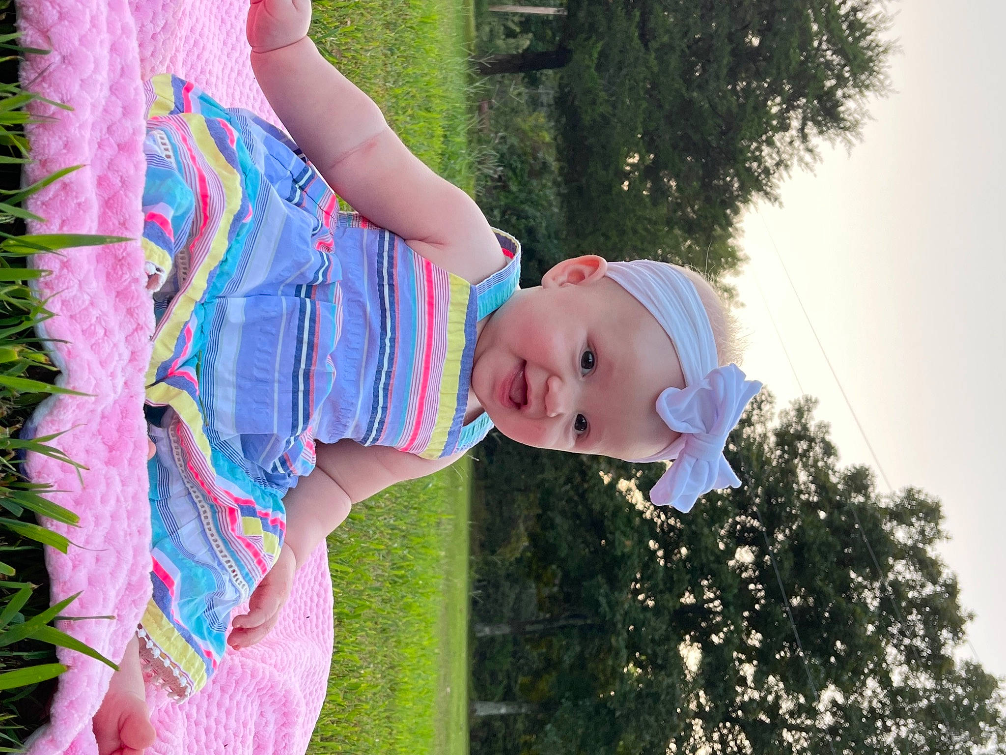 Brinleigh joined the competition — help win amazing prizes! blond, child, electric_blue, facial_expression, fun, grass, happy, leaf, leisure, magenta, pattern, people_in_nature, person, pink, plant, shoulder, sky, sunlight, textile, toddler