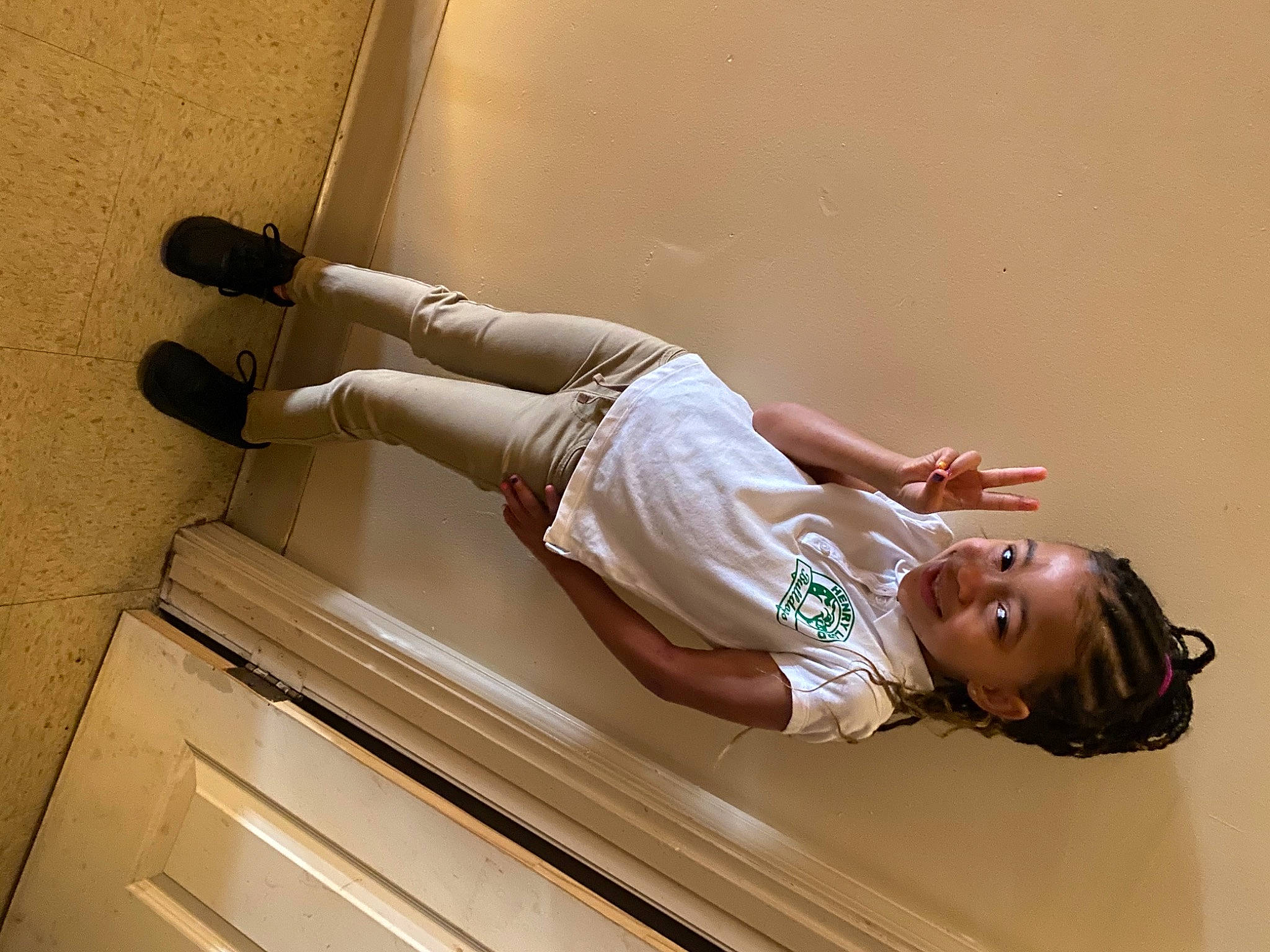 India is registered to the contest to win money with this photo: abdomen, comfort, door, dress, elbow, flash_photography, floor, flooring, happy, hardwood, human_leg, joy, knee, leg, person, shoulder, sitting, stairs, thigh, trunk