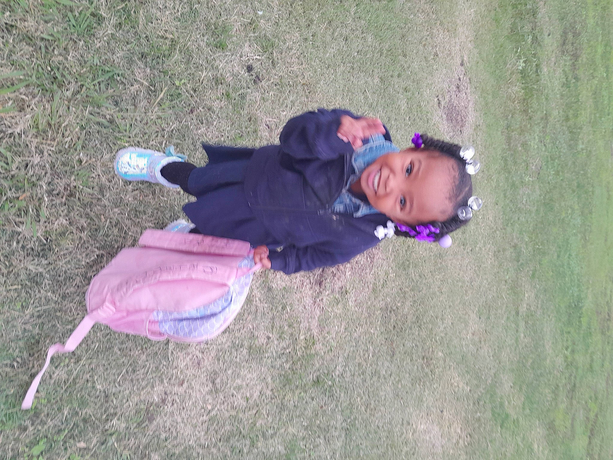 Kyra joined the competition — help win amazing prizes! asphalt, baby_toddler_clothing, child, electric_blue, fun, grass, grassland, joy, landscape, leisure, people_in_nature, person, plant, recreation, shadow, sitting, toddler, tree