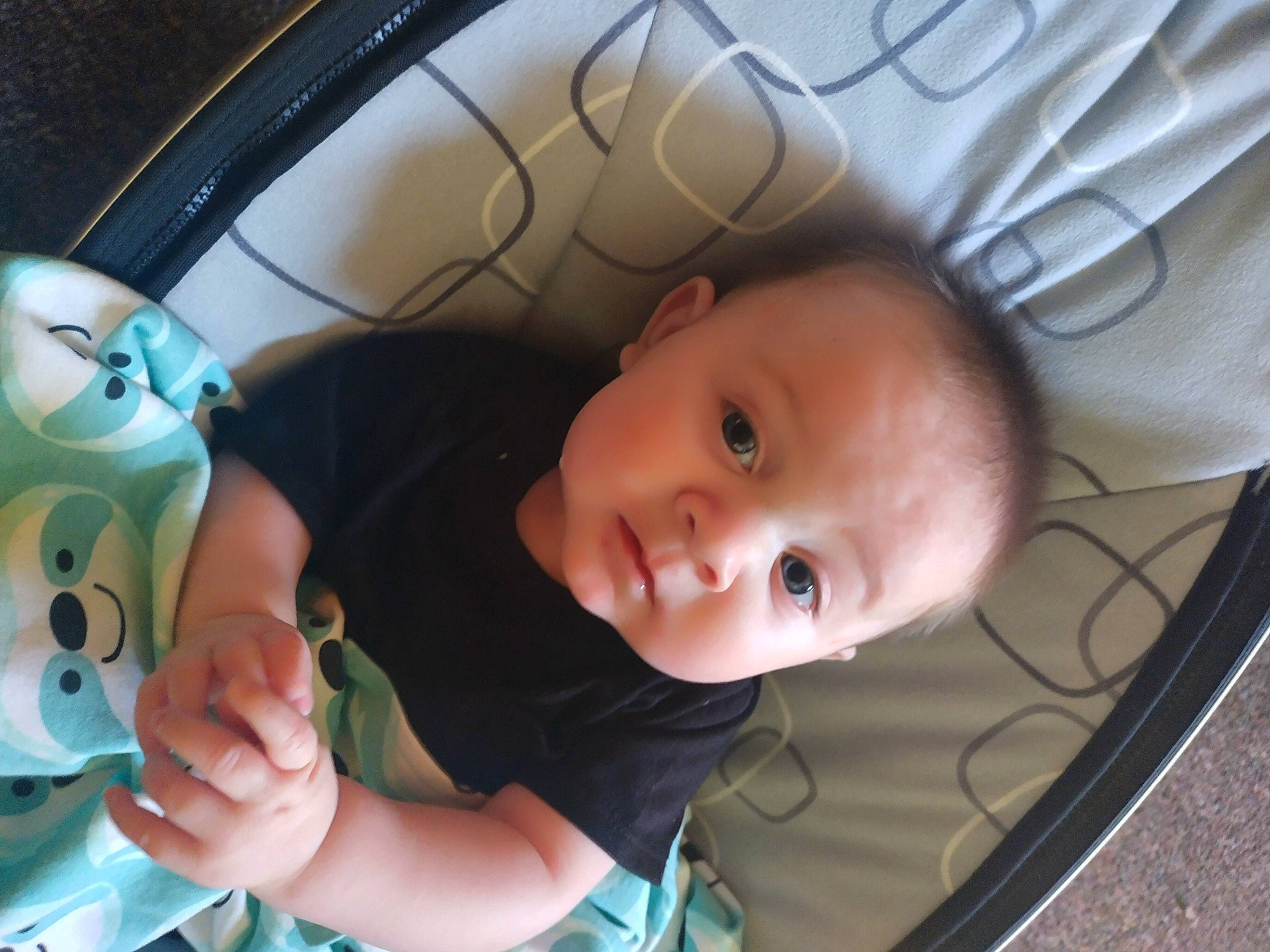 Liam joined the competition — help win amazing prizes! baby, baby_products, baby_toddler_clothing, chair, cheek, child, comfort, eye, happy, iris, mammal, mouth, organ, person, product, room, sitting, skin, smile, toddler