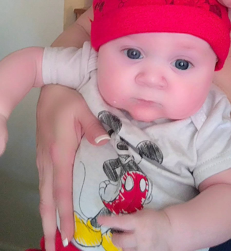 Liam joined the competition — help win amazing prizes! baby, baby_products, baby_toddler_clothing, cap, cheek, child, eye, fashion_accessory, finger, hat, head, headwear, human_body, knit_cap, lip, nose, person, pink, skin, sleeve