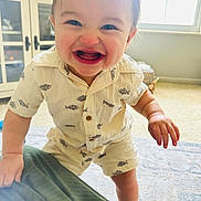 Daniel joined the competition — help win amazing prizes! toddler, child, smile, happy, indoor, window, shirt, shorts, fish_pattern, carpet, cabinet, hand, face, person, clothing, floor, light, room, cute, baby