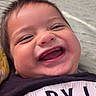 Kaiser joined the competition — help win amazing prizes! baby, smiling, face, closeup, happy, child, infant, mouth, teeth, eyes, skin, hair, clothing, black_shirt, text, indoor, portrait, cute, joy, expression