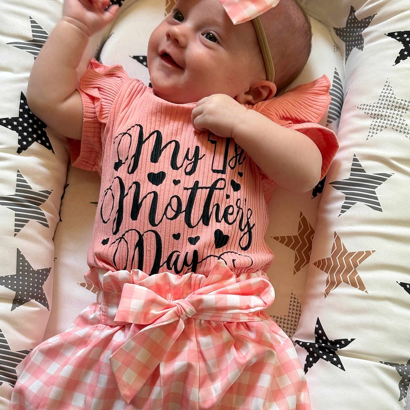 Opal is registered to the contest to win money with this photo: baby, bed, bedroom, clothing, couch, cushion, face, furniture, hat, head, homedecor, indoors, newborn, pajamas, person, photography, portrait, quilt, room, t_shirt