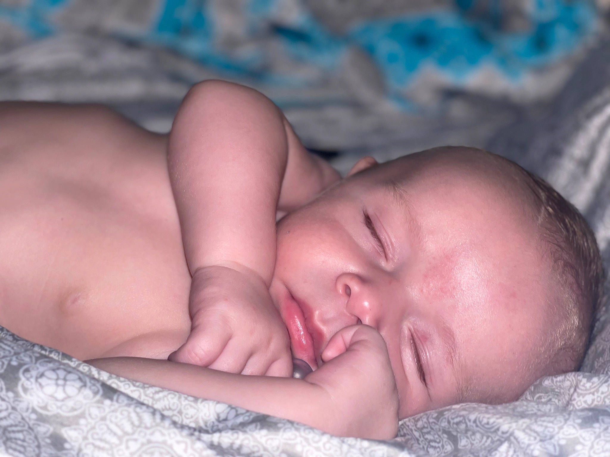 Tucoma Jr joined the competition — help win amazing prizes! baby, bed, bedtime, blue, cheek, child, chin, close_up, comfort, eyebrow, face, finger, head, linens, mammal, mouth, nap, nose, person, skin
