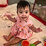 Alanna joined the competition — help win amazing prizes! baby, child, pink_dress, toy, playmat, indoor, smiling, sitting, cute, infant, happy, face, person, floor, colorful, playtime, hand, foot, pattern, young