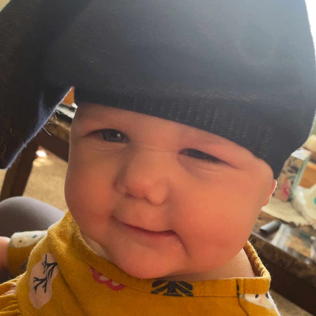 Raylynn joined the competition — help win amazing prizes! baby, baseballcap, beanie, bonnet, cap, clothing, face, fleece, happy, hat, head, hood, hoodie, knitwear, person, photography, portrait, smile, sweater, sweatshirt