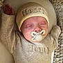 Henry joined the competition — help win amazing prizes! baby, sleeping, pacifier, knit_hat, knit_sweater, beige, infant, cozy, blanket, resting, newborn, child, cute, soft_texture, peaceful, portrait, indoor, closeup, face, headwear