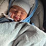 baby, newborn, infant, pacifier, knit_hat, hood, blanket, car_seat, carseat, smile, closed_eyes, cheeks, portrait, cuddly, blue, soft_texture, seated, cute, sleeping, bundle