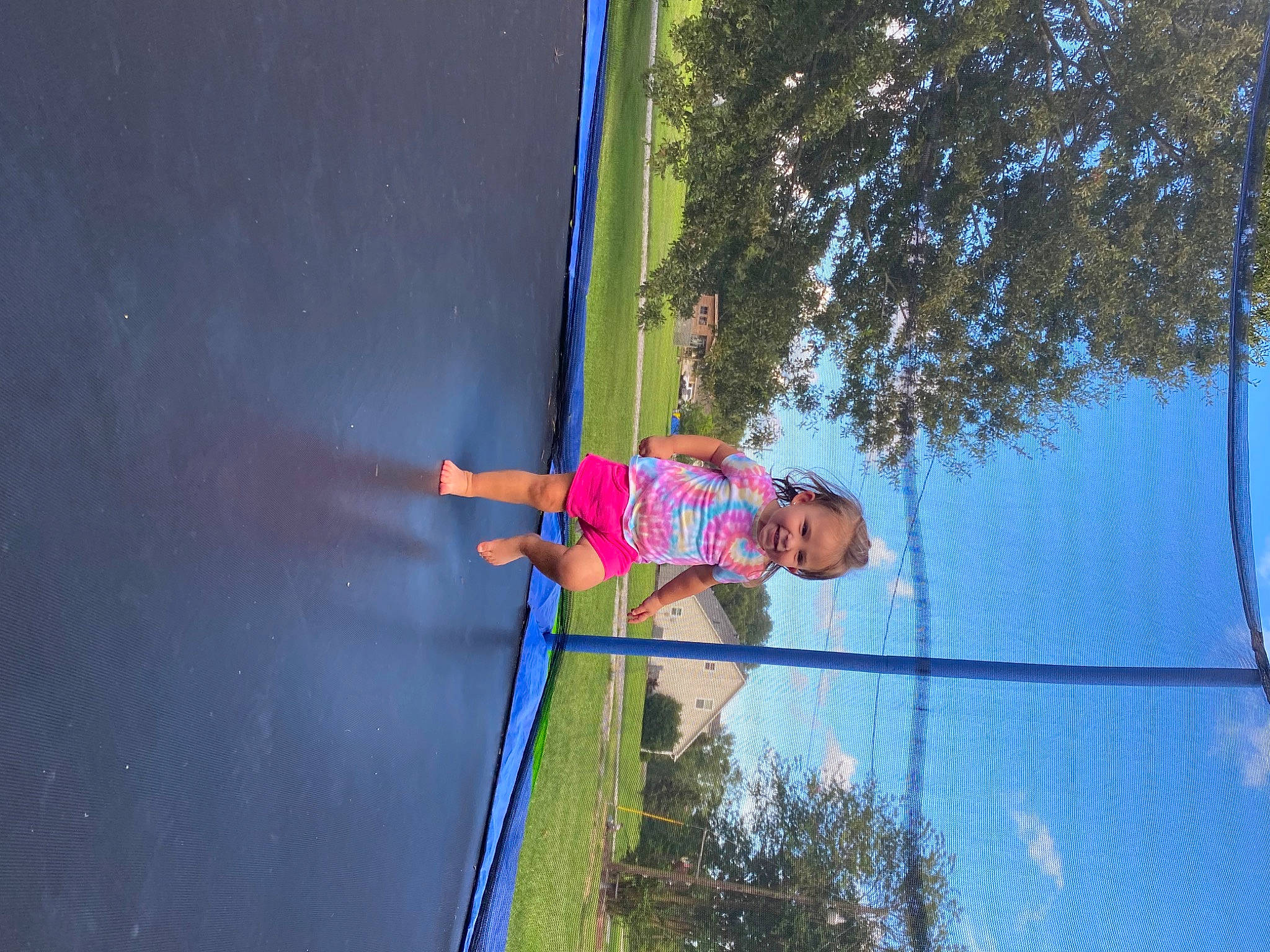 Claire joined the competition — help win amazing prizes! adventure, asphalt, electric_blue, fun, grass, joy, jumping, leisure, outdoor_play_equipment, person, plant, pole, recreation, rope, sky, sport_climbing, sports, sports_equipment, tire, trampoline