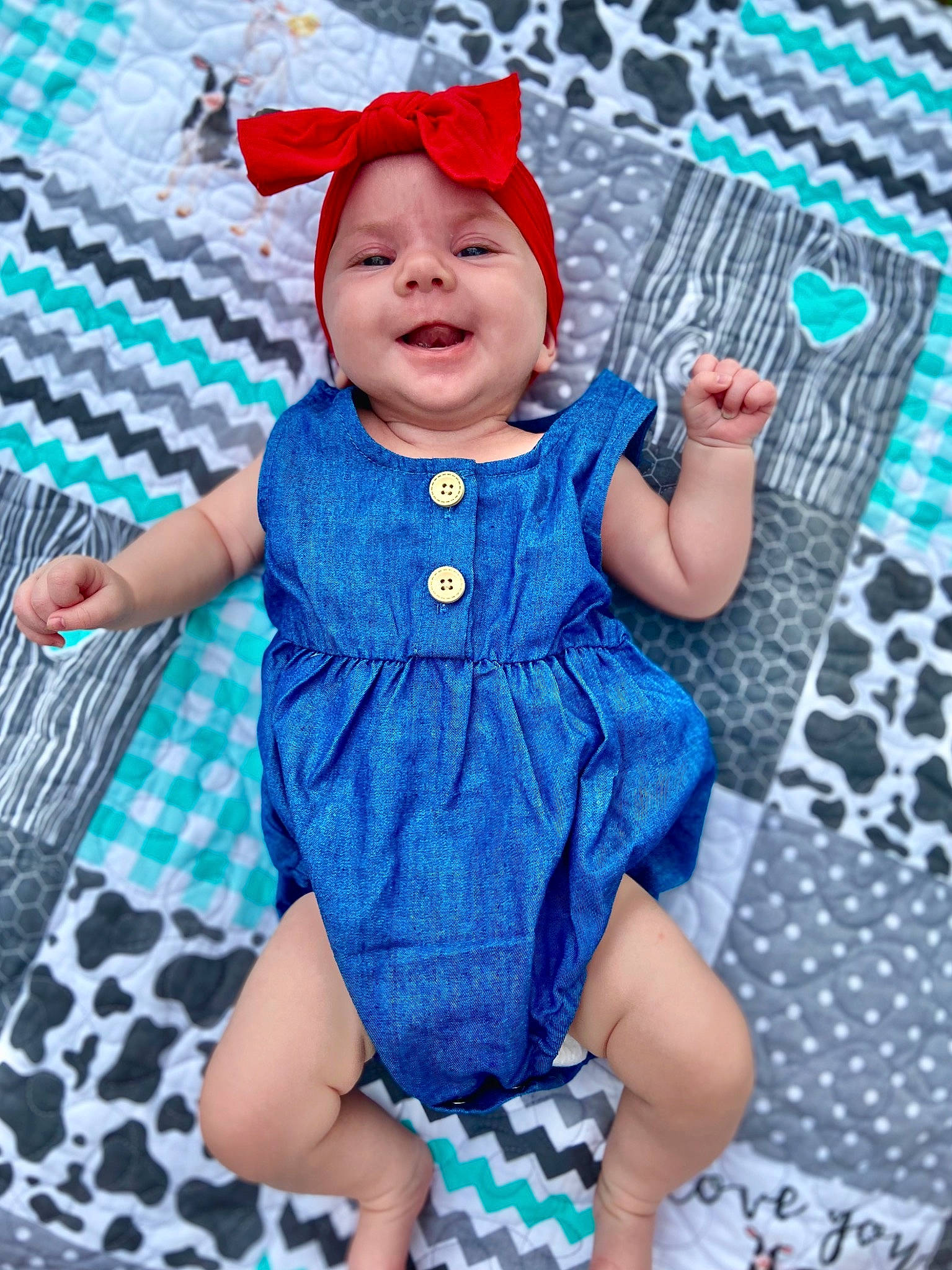 Ryleigh joined the competition — help win amazing prizes! aqua, azure, baby, baby_toddler_clothing, blue, child, day_dress, dress, electric_blue, happy, headwear, one_piece_garment, pattern, person, photograph, pink, purple, skin, sleeve, smile