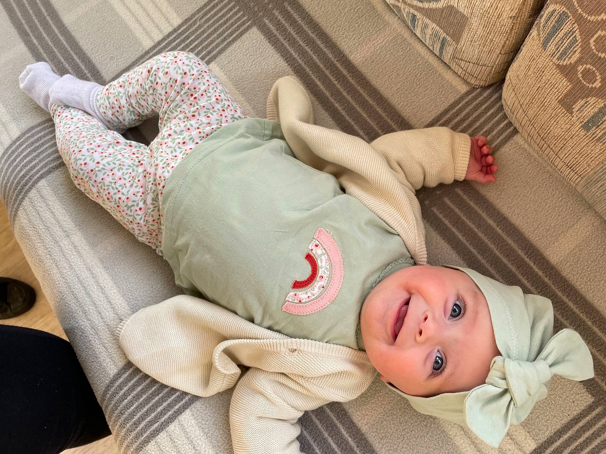 Olivia participe au concours pour gagner de l'argent avec cette photo : baby, baby_toddler_clothing, child, comfort, couch, foot, fur, hat, headwear, human_leg, joy, knee, linens, nap, person, room, sitting, sleep, smile, textile