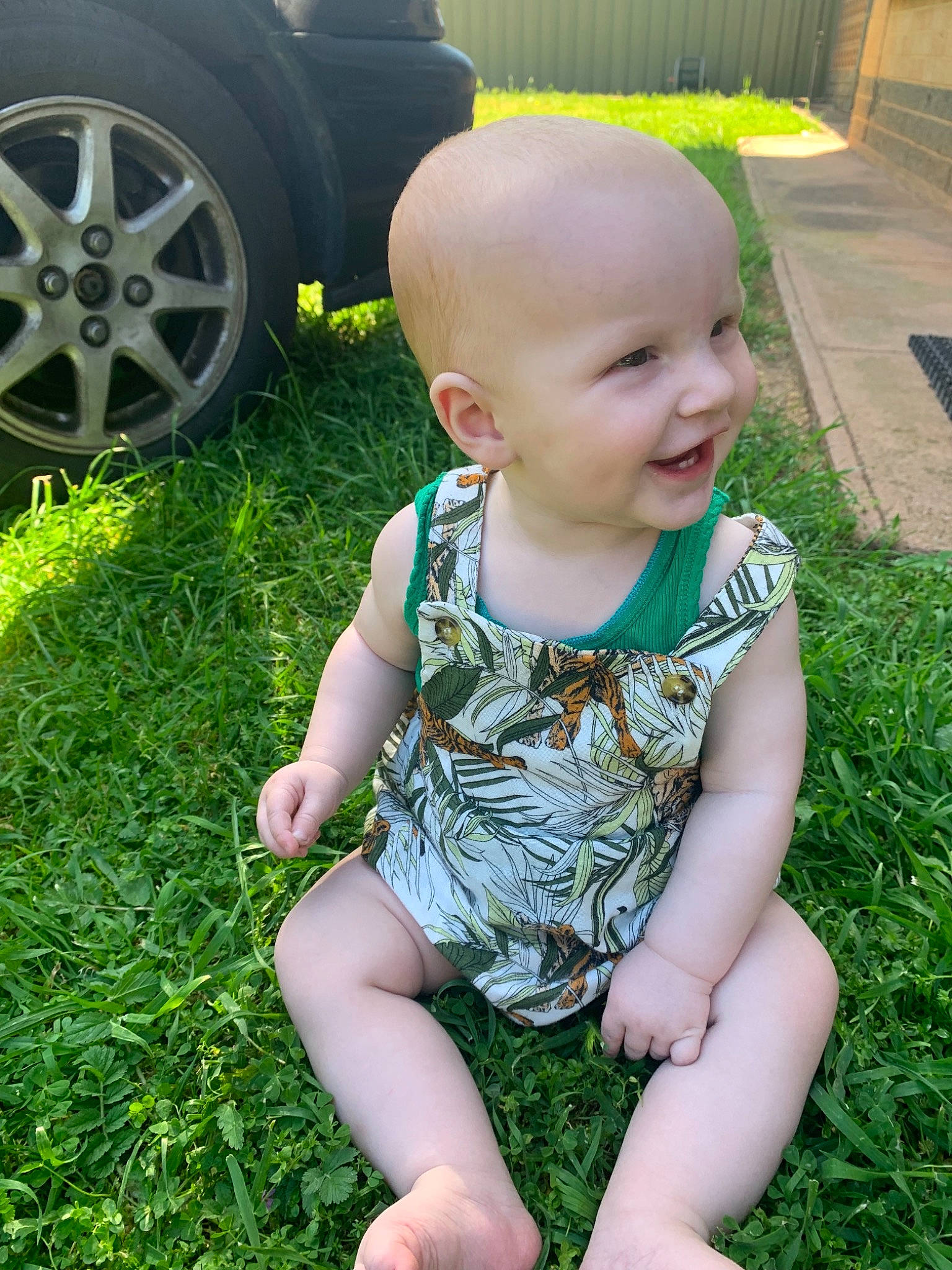 Korbin joined the competition — help win amazing prizes! auto_part, baby, baby_toddler_clothing, backyard, child, garden, grass, grass_family, green, joy, lawn, leg, person, plant, sitting, smile, summer, toddler, vacation, yard