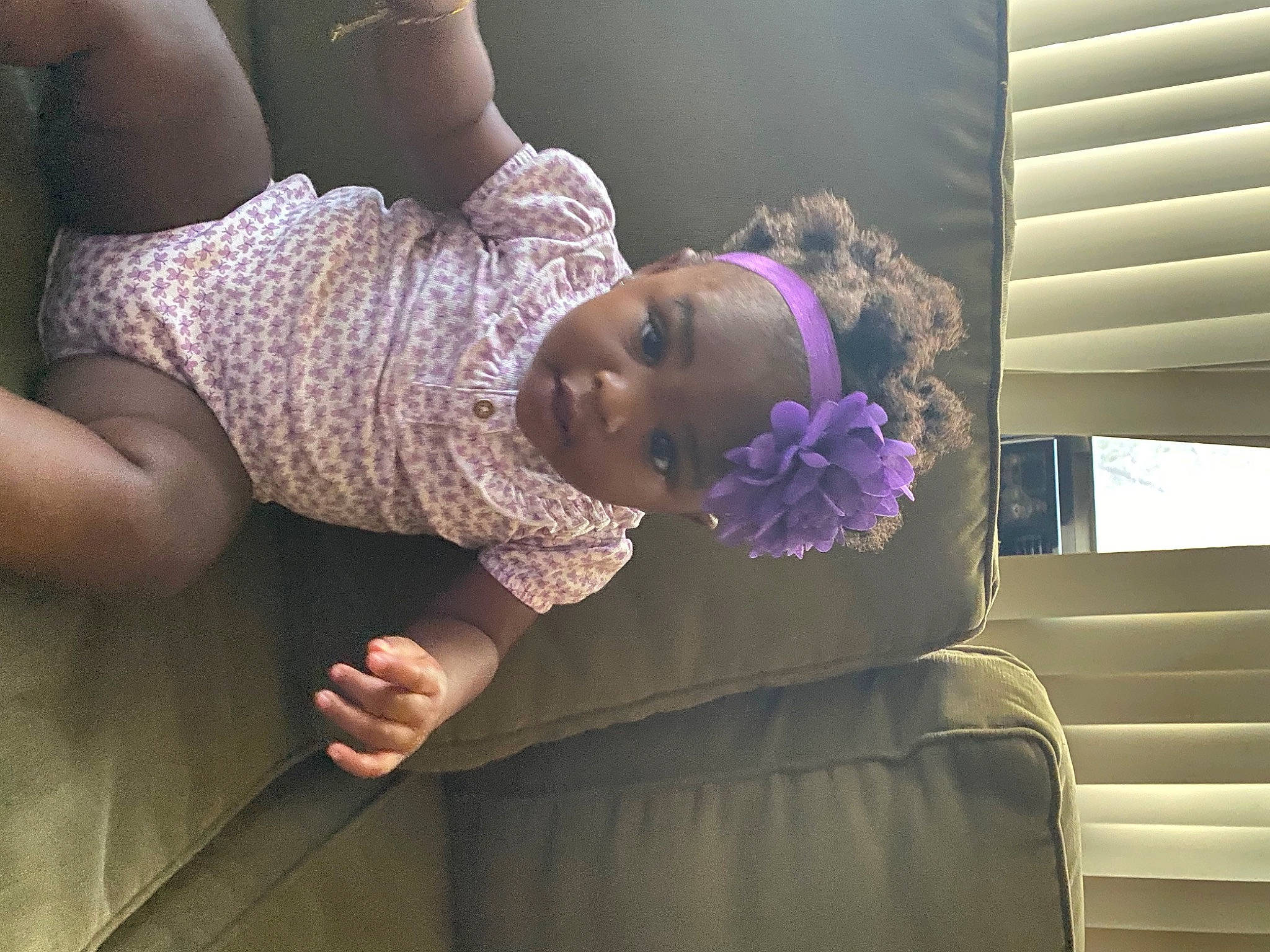 Dmariah is registered to the contest to win money with this photo: arm, comfort, couch, elbow, finger, glasses, hand, knee, leg, nail, person, pink, plant, purple, shoulder, sunglasses, textile, thigh, toddler, violet