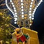 dog, pug, holiday_outfit, christmas_lights, night, festive, decorations, tree, ornaments, outdoor, celebration, cute, pet, animal, illumination, gold_lights, greenery, costume, winter, holiday